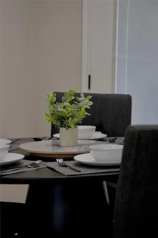 a view of a workspace with furniture