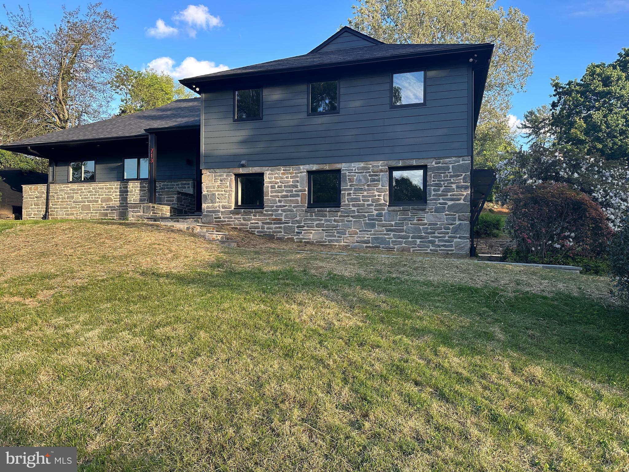 713 Woodfield Road Villanova, PA 19085 - Photo 7 of 36 a view of a house with a yard