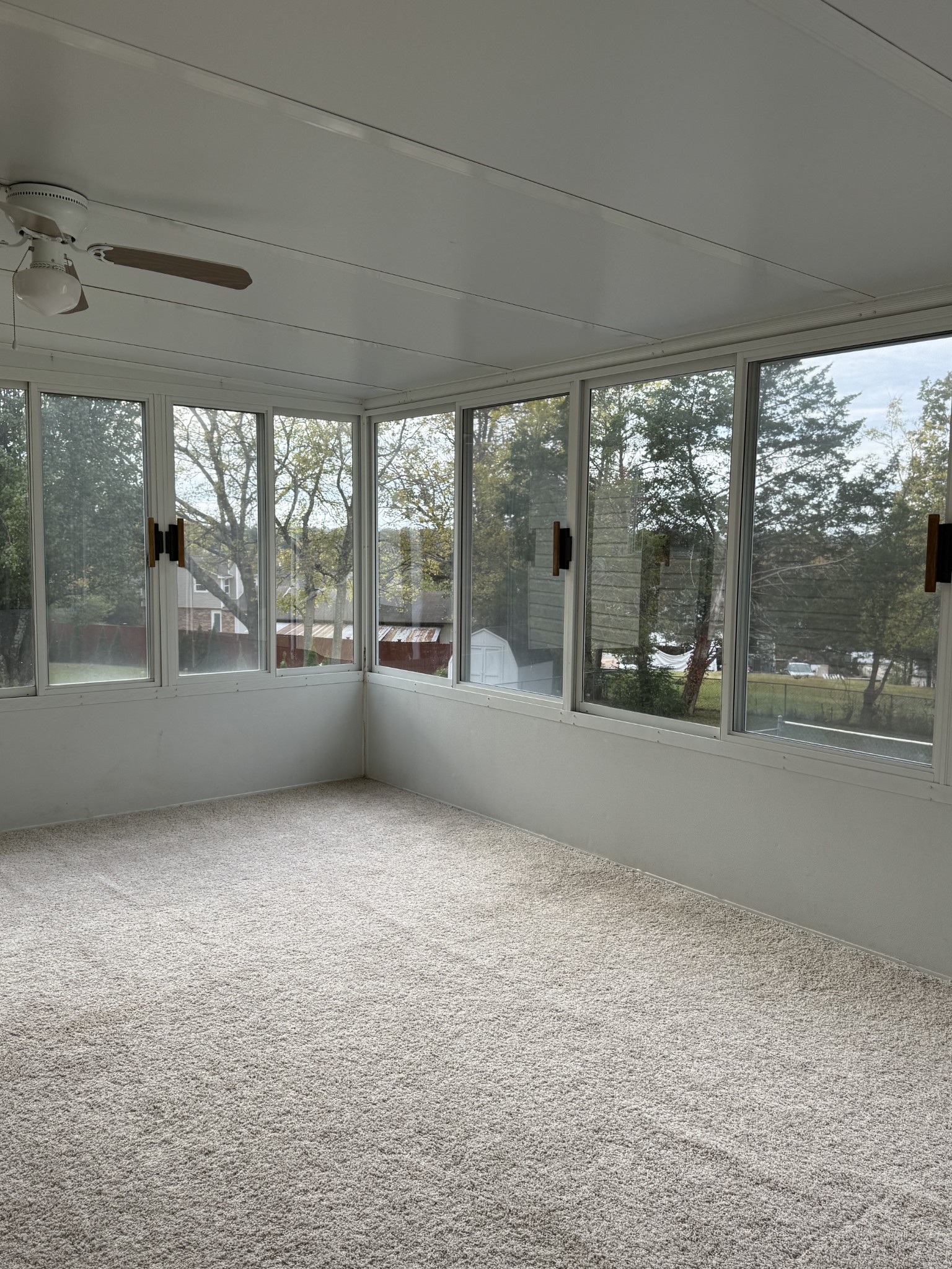 3308 Shakertown Road Antioch, TN 37013 - Photo 15 of 28 en empty room with large windows and view