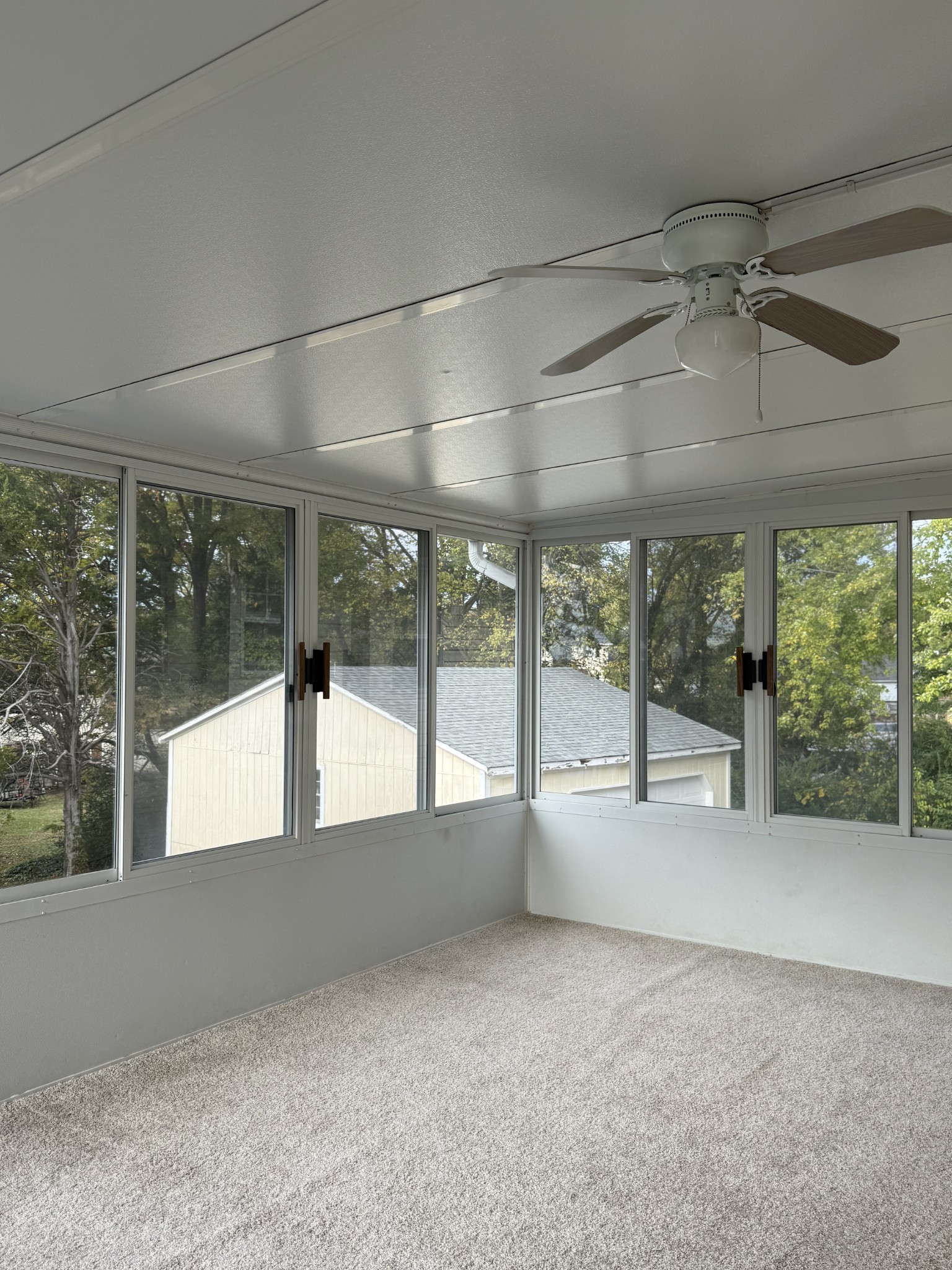 3308 Shakertown Road Antioch, TN 37013 - Photo 16 of 28 a view of an empty room with a fireplace and a large window