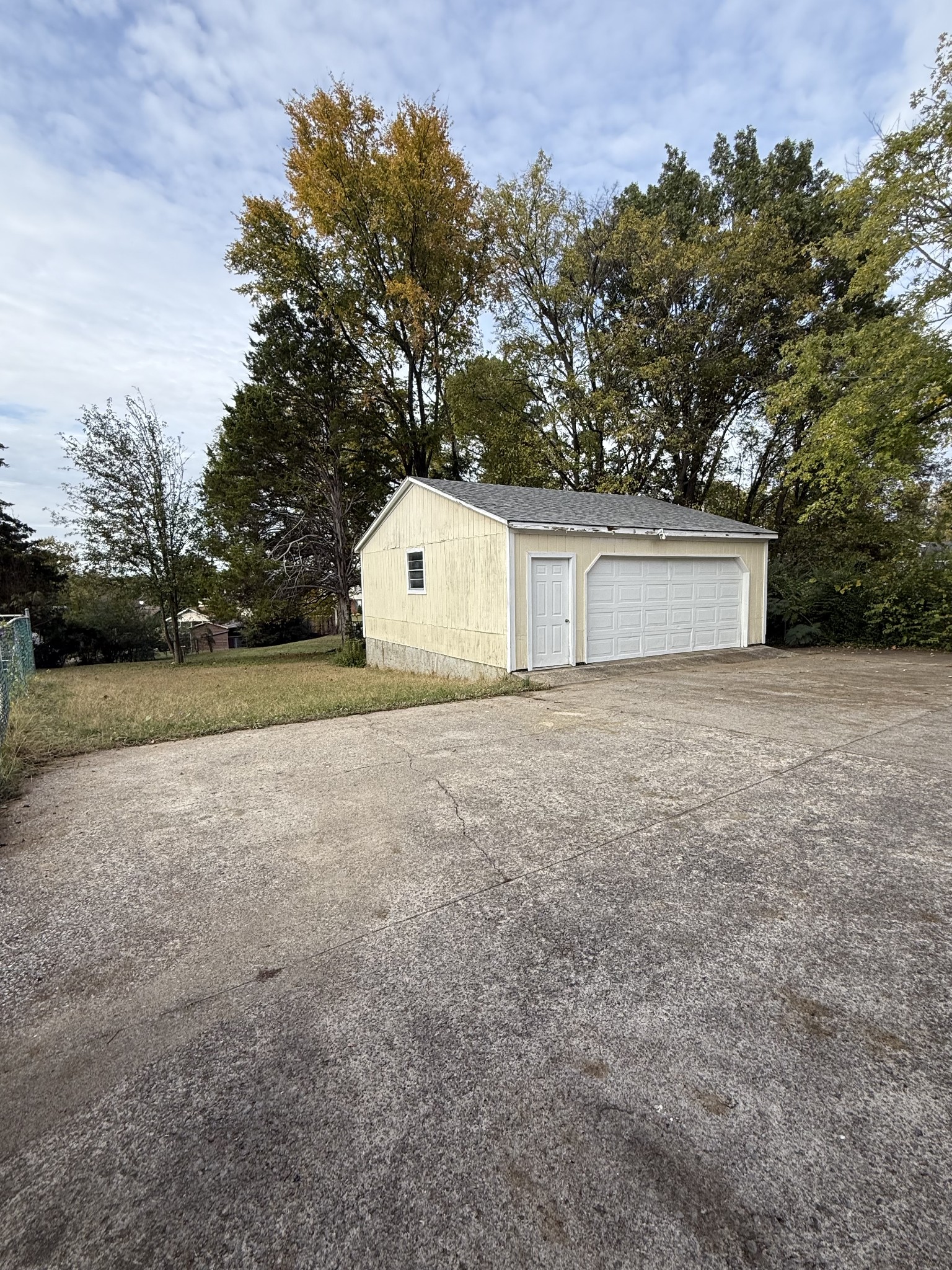 3308 Shakertown Road Antioch, TN 37013 - Photo 26 of 28 a view of white house with a yard and large tree