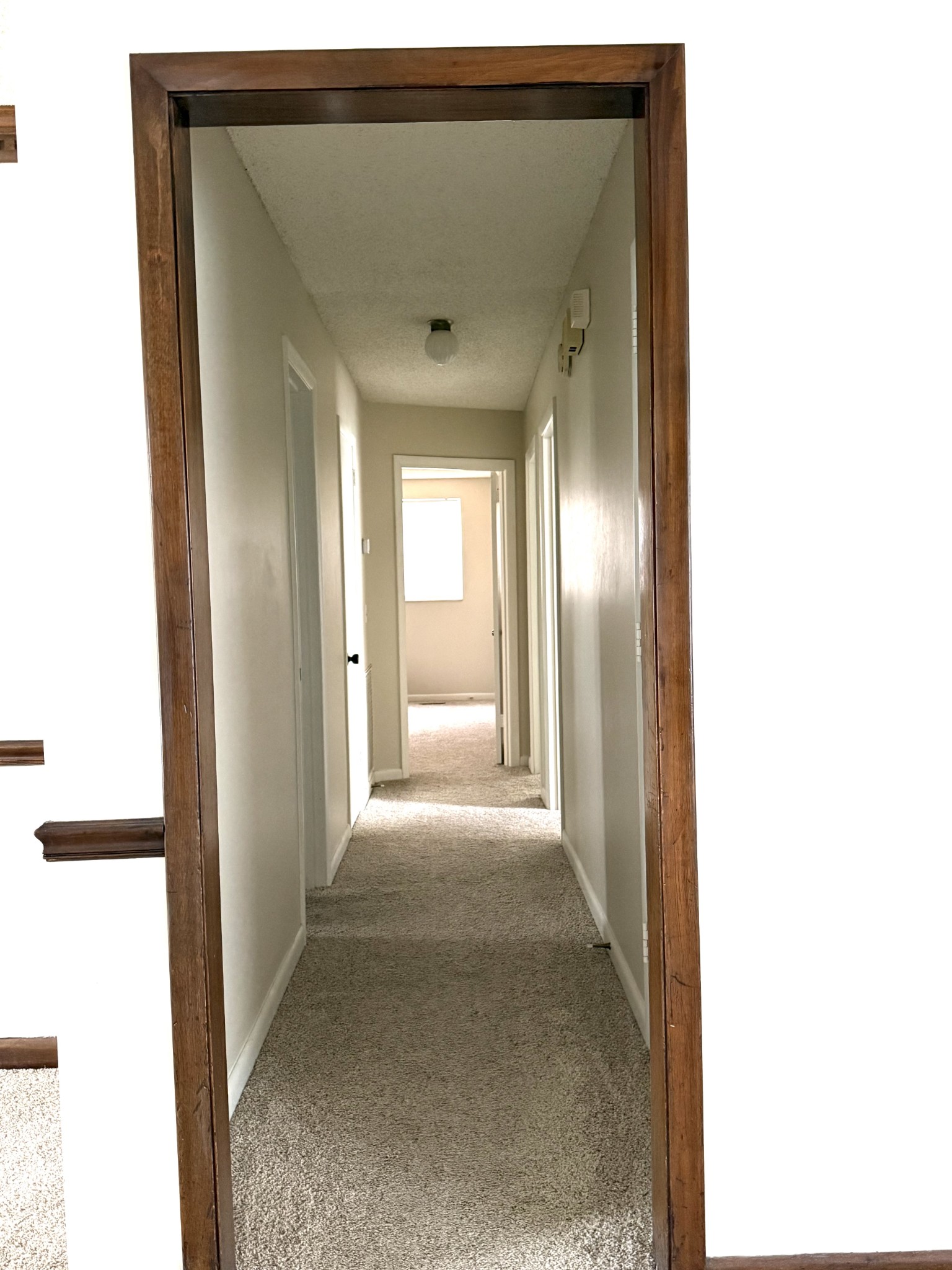 3308 Shakertown Road Antioch, TN 37013 - Photo 6 of 28 a view of a hallway with wooden floor