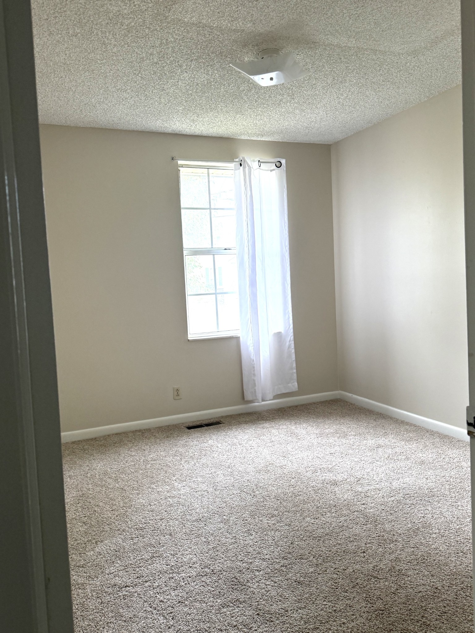 3308 Shakertown Road Antioch, TN 37013 - Photo 8 of 28 an empty room with windows