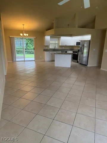 a kitchen with stainless steel appliances a sink and a counter top space