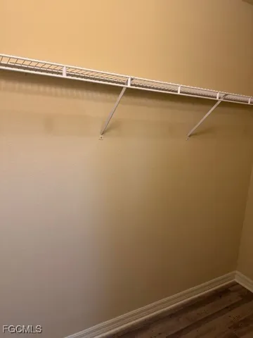 a view of a room with racks on the wall