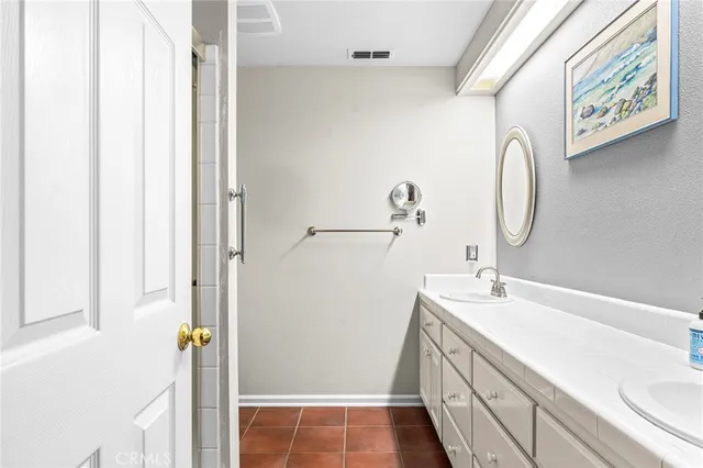 a bathroom with a toilet and a sink