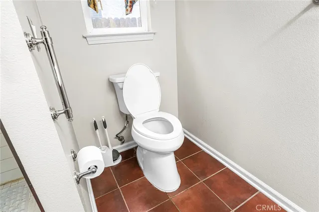 a bathroom with a double vanity sink mirror and shower