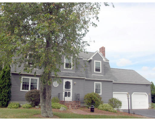24 Hanson Road Charlton, MA 01507 - Photo 1 of 17 a front view of a house with a yard