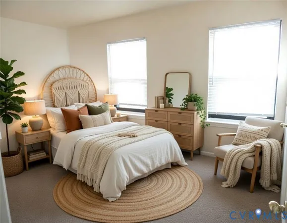 a living room with furniture rug and window