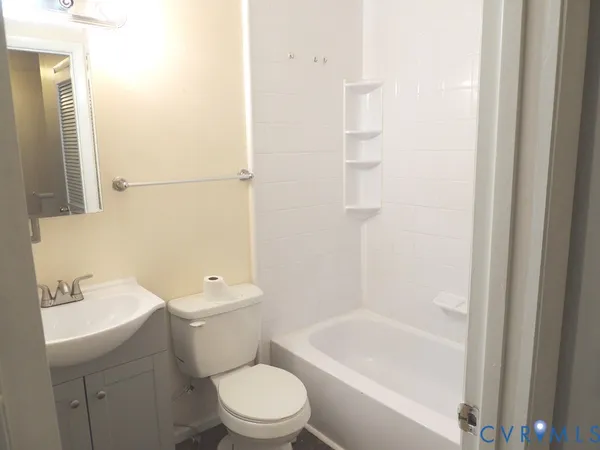 a view of a bathroom with shower
