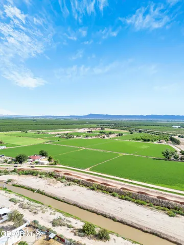 a kitchen with a refrigerator and a sink
