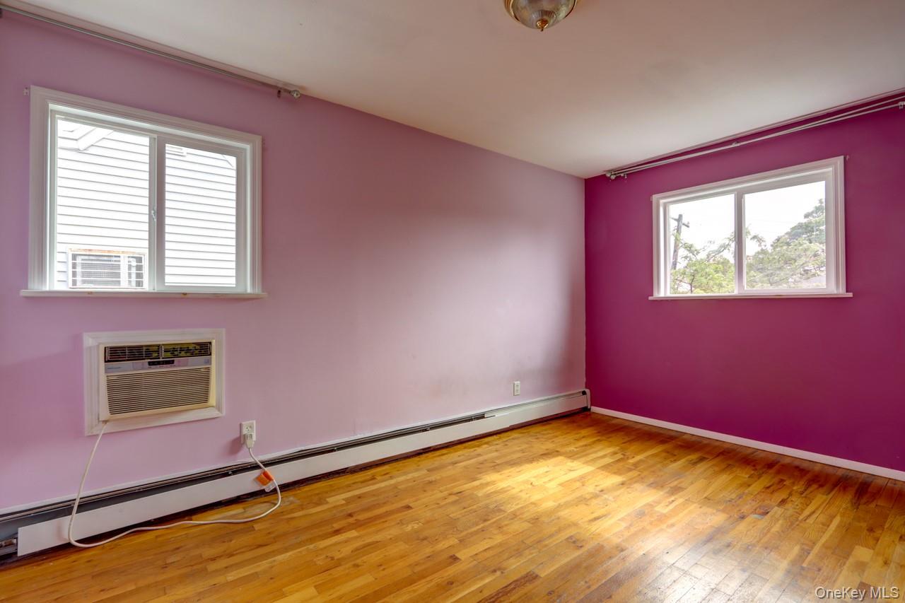 12-67 Waterview Street Queens, NY 11691 - Photo 5 of 14 a view of empty room with window