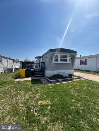 a view of a back yard of the house