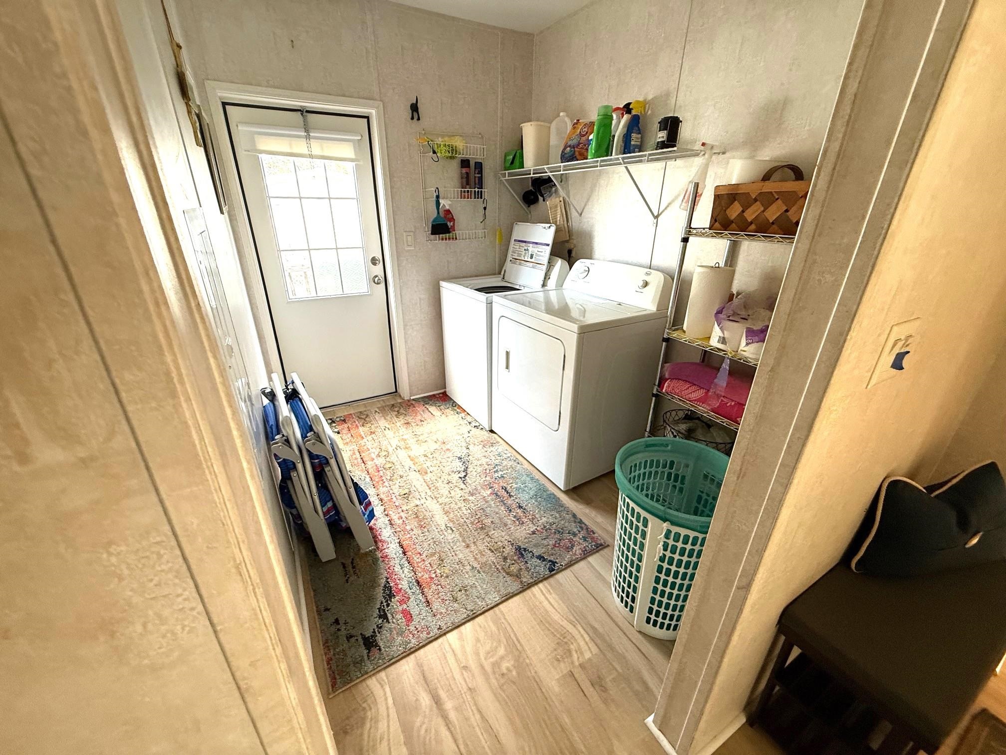 292 Majorca Road St. Augustine, FL 32080 - Photo 15 of 32 Laundry room with light wood-style flooring and independent washer and dryer