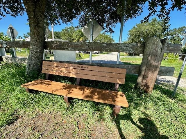 292 Majorca Road Butler Beach, FL 32080 - Photo 21 of 27 a view of a bench in a garden