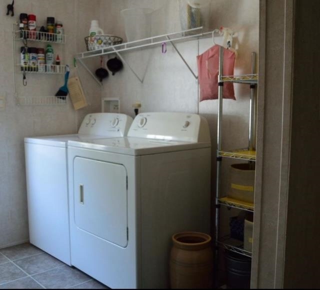 292 Majorca Road Butler Beach, FL 32080 - Photo 27 of 27 a utility room with dryer and washer