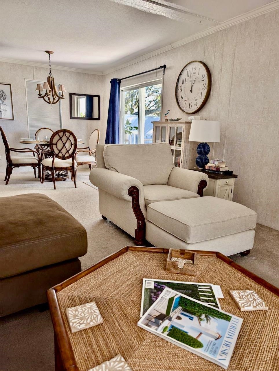 292 Majorca Road Butler Beach, FL 32080 - Photo 6 of 27 a living room with furniture a rug and white walls