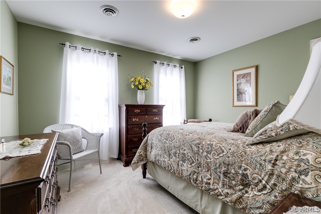 538 Courthouse Road Richmond, VA 23236 - Photo 17 of 24 a bedroom with a bed and a window