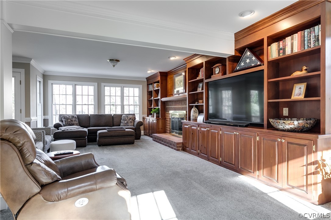 538 Courthouse Road Richmond, VA 23236 - Photo 5 of 24 a living room with furniture and a flat screen tv