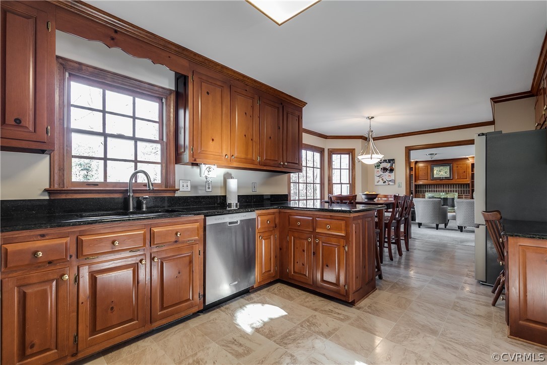 538 Courthouse Road Richmond, VA 23236 - Photo 9 of 24 a kitchen with stainless steel appliances granite countertop wooden cabinets a sink and a stove