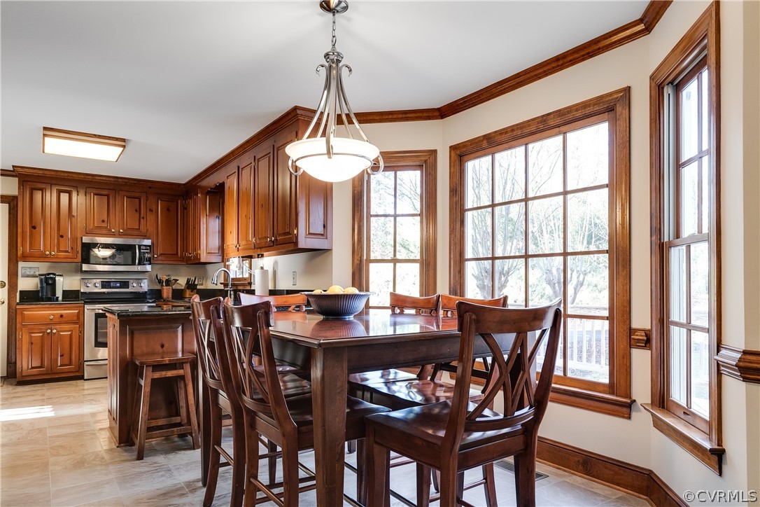 538 Courthouse Road Richmond, VA 23236 - Photo 10 of 24 a view of a dining room with furniture window and wooden floor
