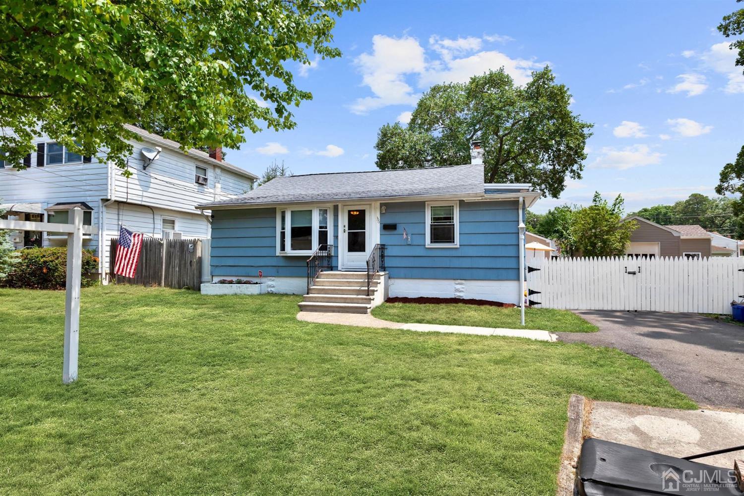 36 Landvale Road Spotswood, NJ 08884 - Photo 1 of 15 a view of a house with a backyard