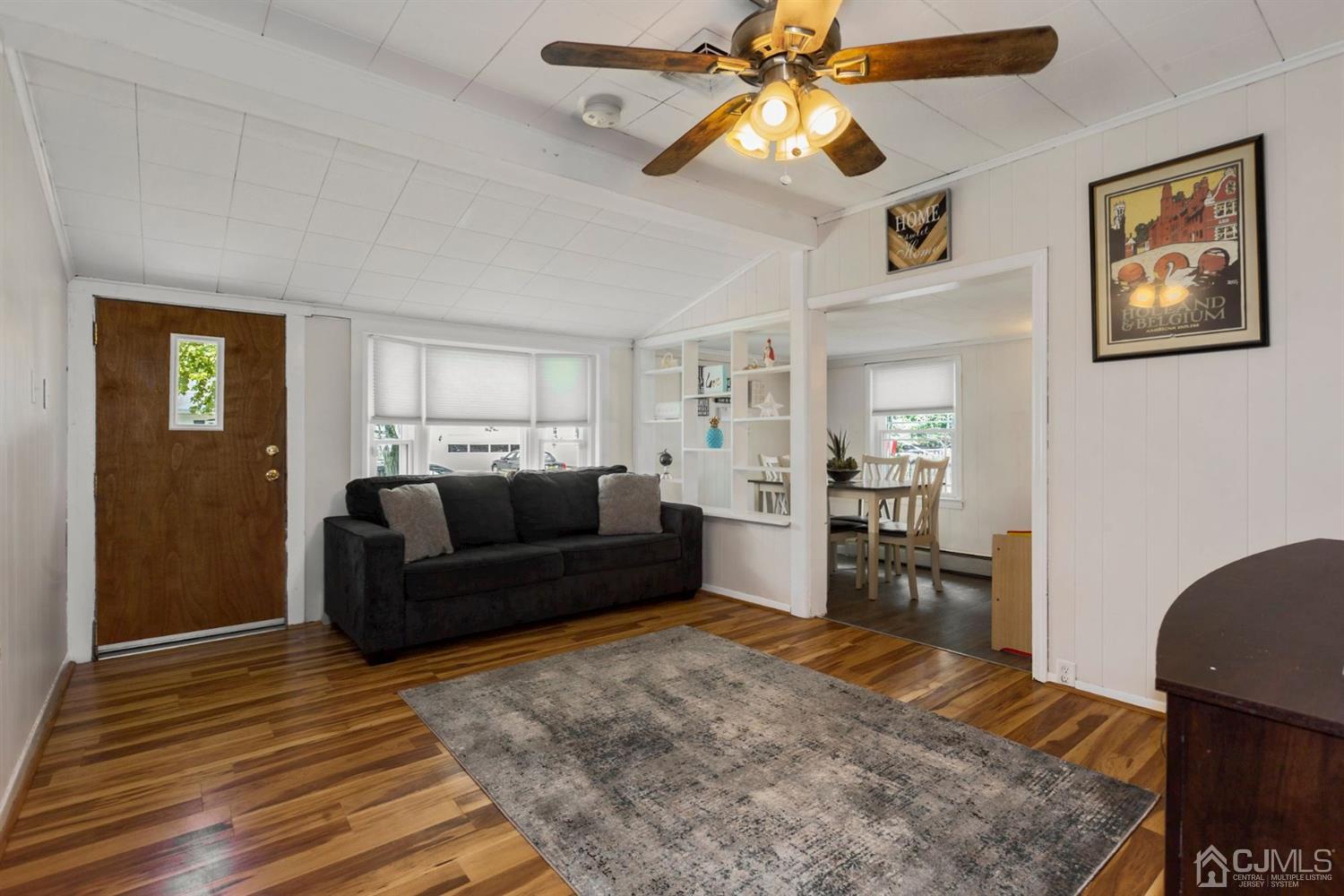 36 Landvale Road Spotswood, NJ 08884 - Photo 2 of 15 a living room with furniture and a wooden floor