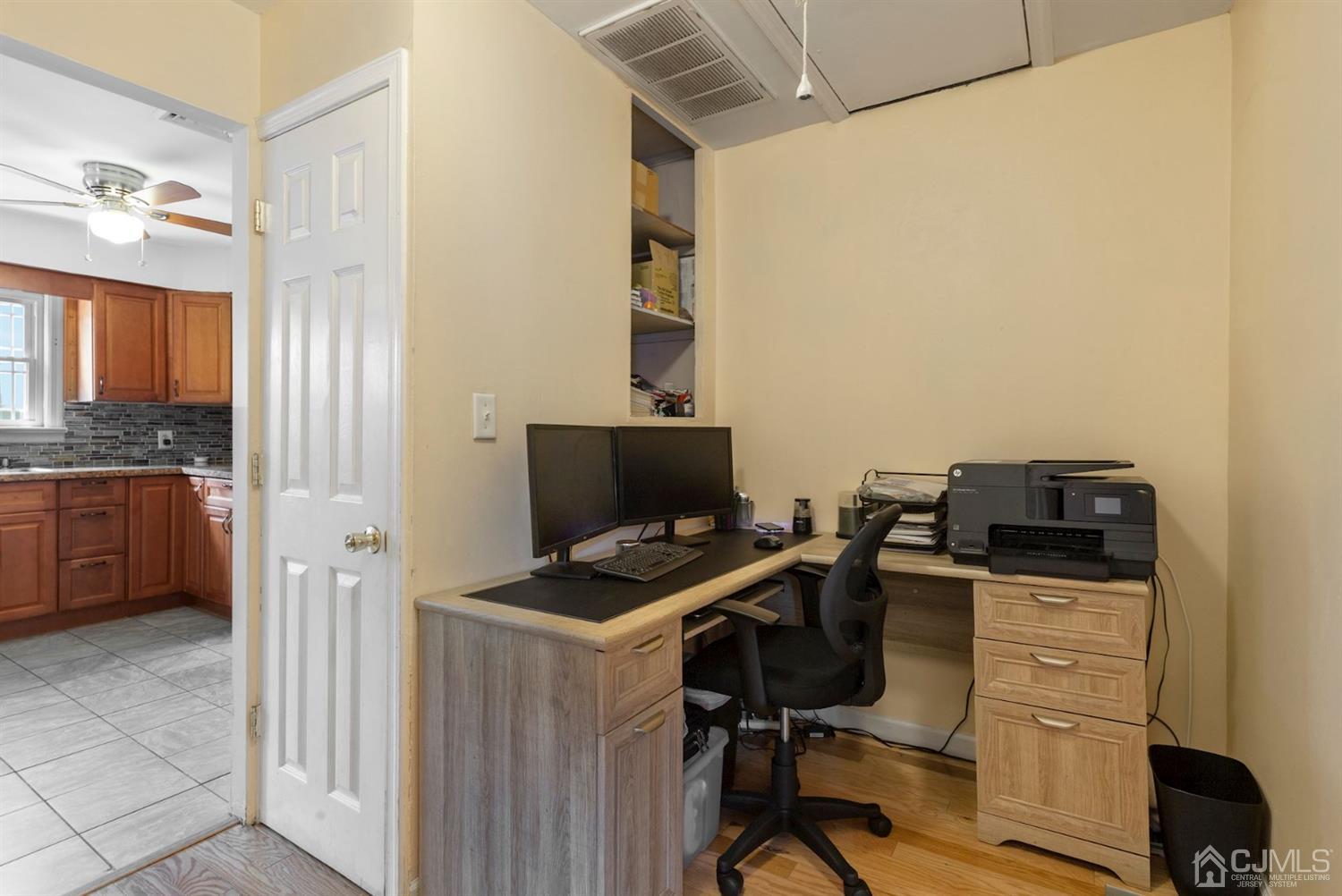 36 Landvale Road Spotswood, NJ 08884 - Photo 13 of 15 a view of a workspace with furniture and a window