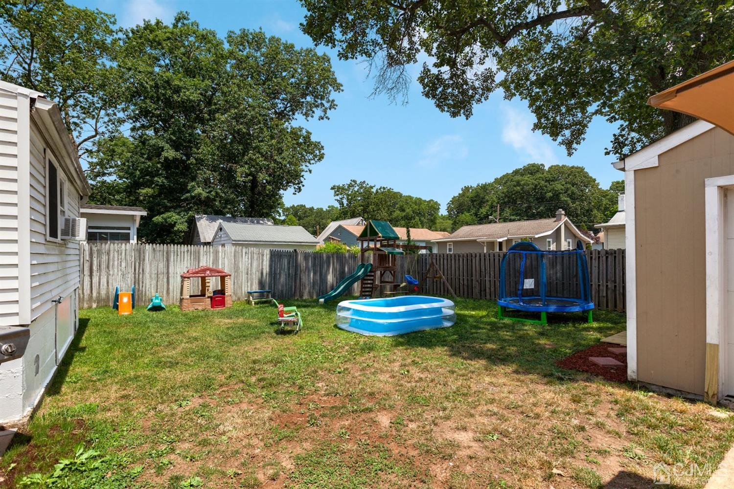 36 Landvale Road Spotswood, NJ 08884 - Photo 15 of 15 a view of a house with backyard and sitting area