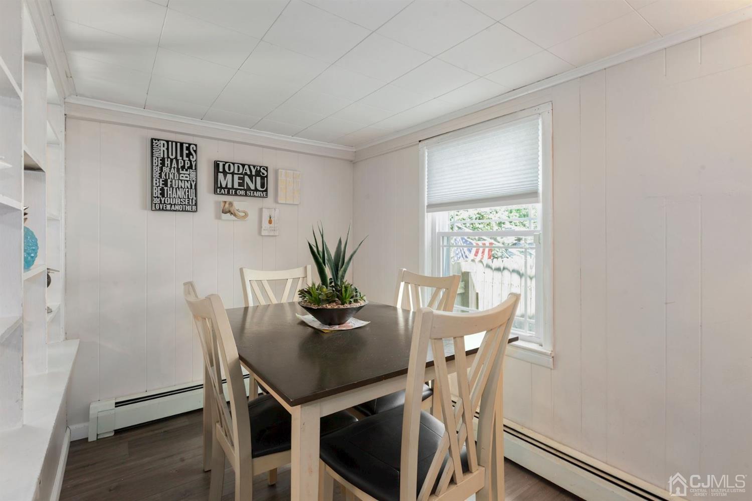 36 Landvale Road Spotswood, NJ 08884 - Photo 4 of 15 a view of a dining room with furniture and window