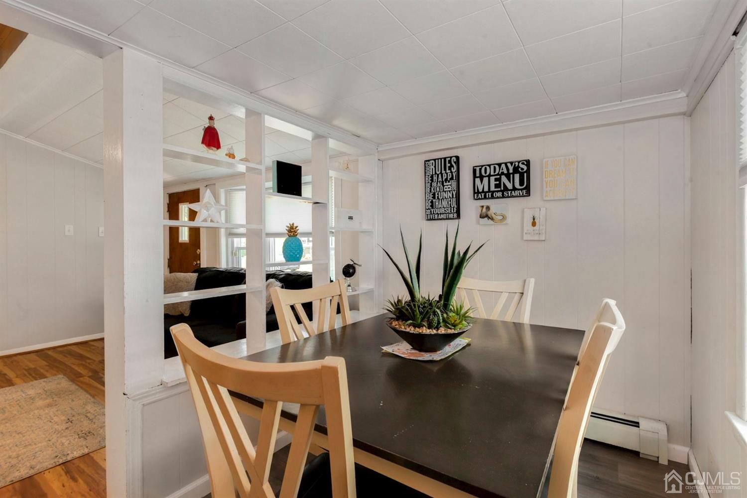36 Landvale Road Spotswood, NJ 08884 - Photo 5 of 15 a view of a dining room with furniture and wooden floor