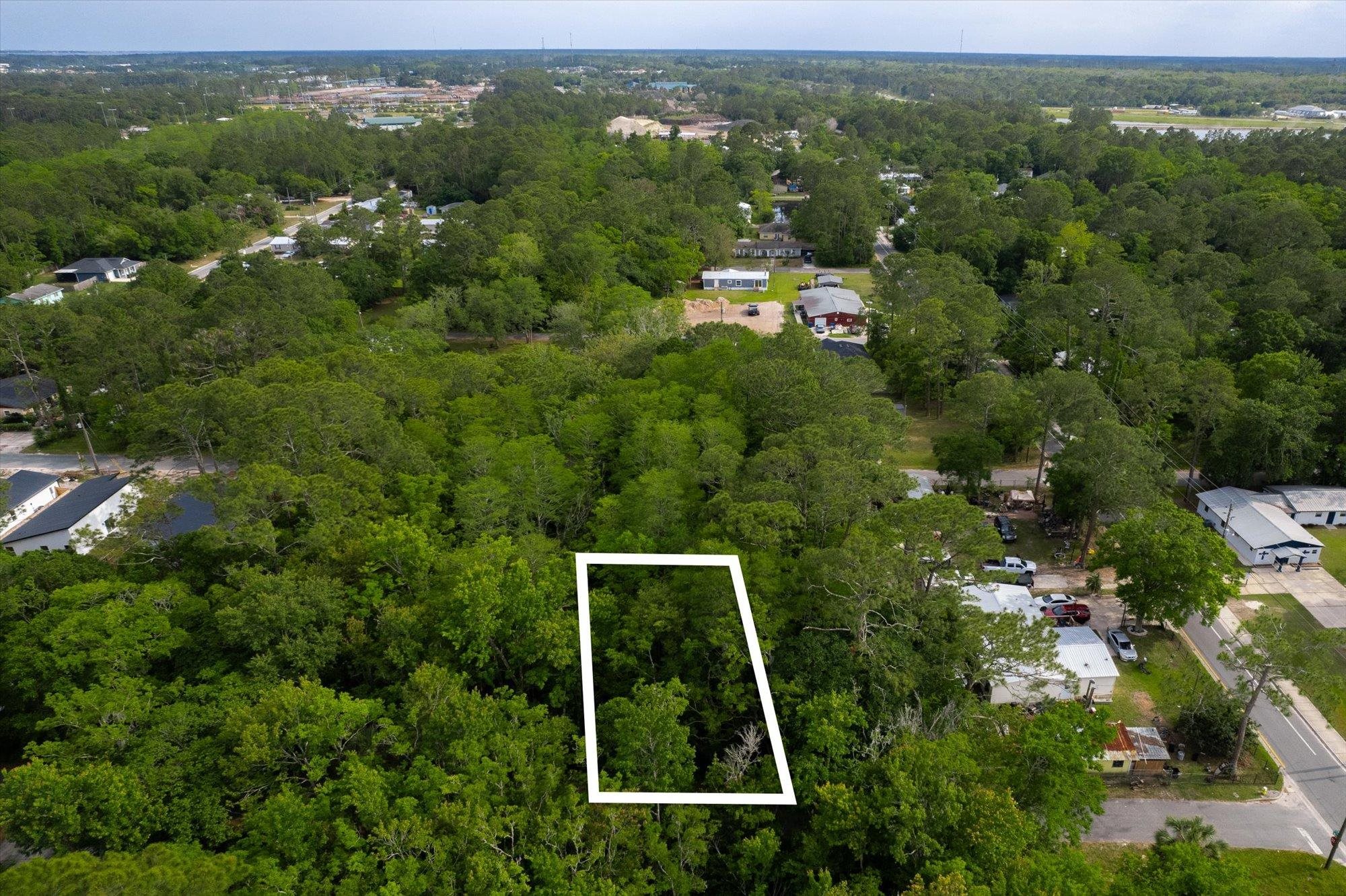 0 West 8th Street St. Augustine, FL 32084 - Photo 3 of 31 an aerial view of residential houses with outdoor space and trees