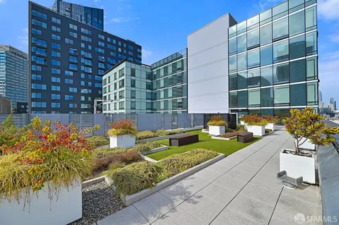 a view of a chairs and table in a patio
