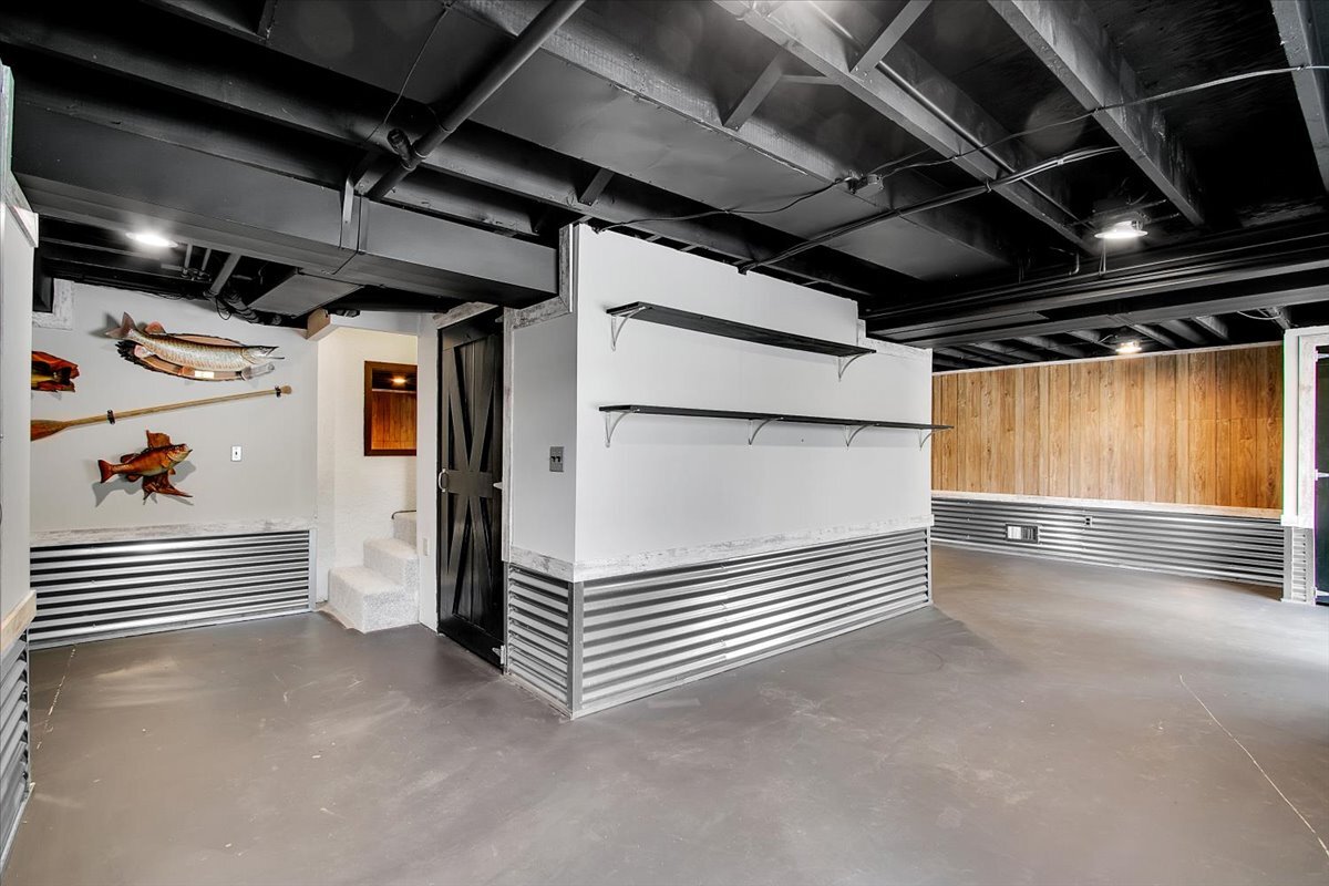 25734 Hickory Court Minooka, IL 60447 - Photo 20 of 35 a view of an empty room with wooden walls