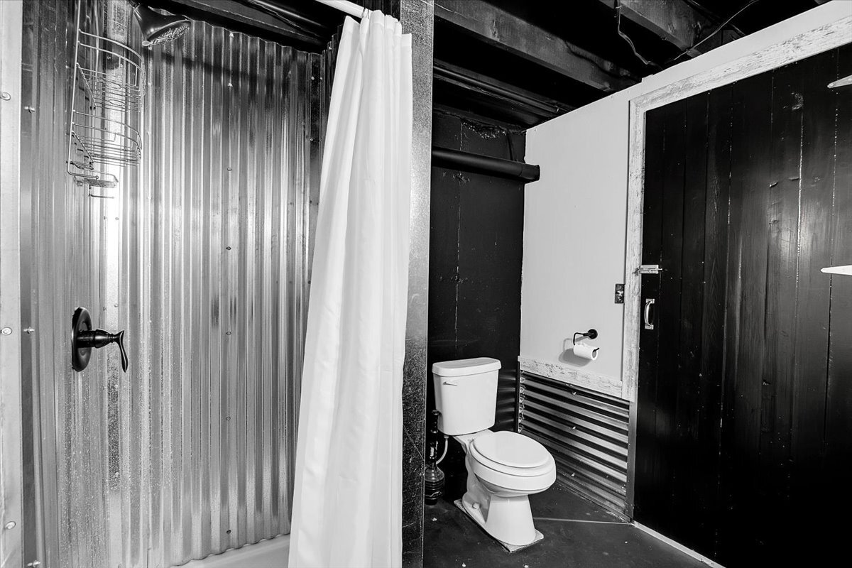 25734 Hickory Court Minooka, IL 60447 - Photo 23 of 35 a bathroom with a toilet and a shower