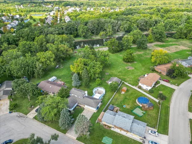 an aerial view of a golf course with a garden
