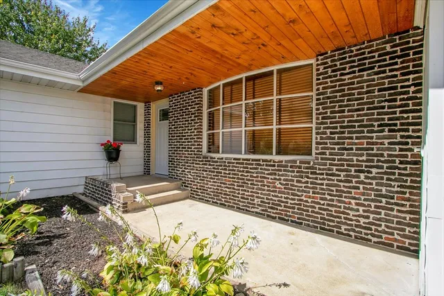 a view of a backyard with a garden