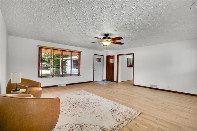 a view of livingroom with furniture and window