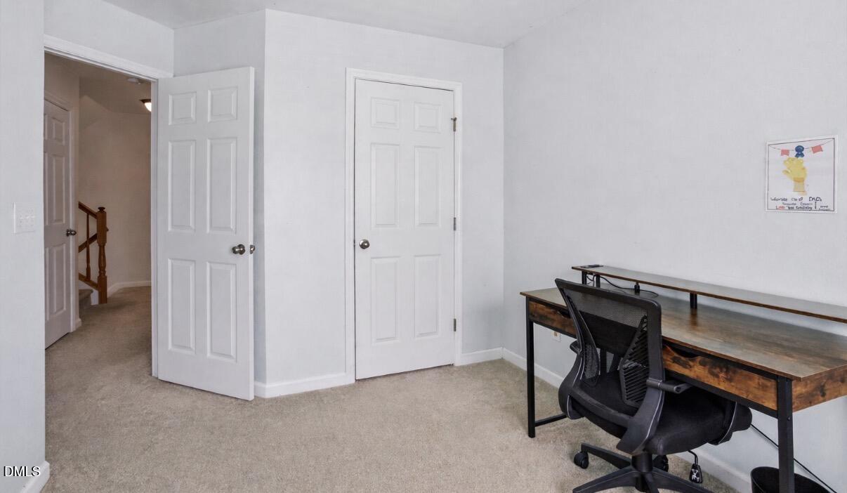 2211 Raven Road, Unit 108 Raleigh, NC 27614 - Photo 10 of 17 a view of a hallway with closet