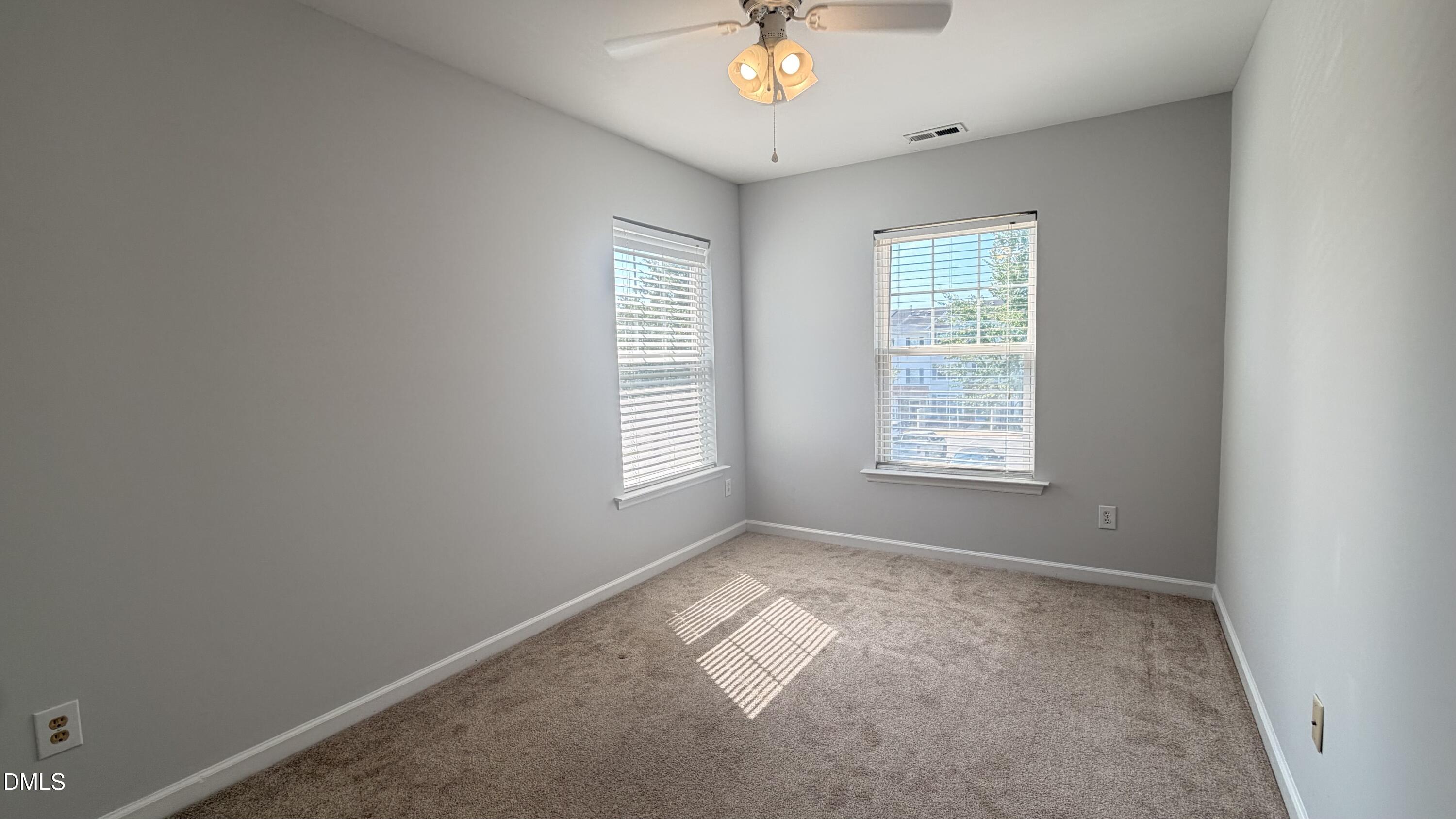 2211 Raven Road, Unit 108 Raleigh, NC 27614 - Photo 11 of 17 a view of an empty room with a window