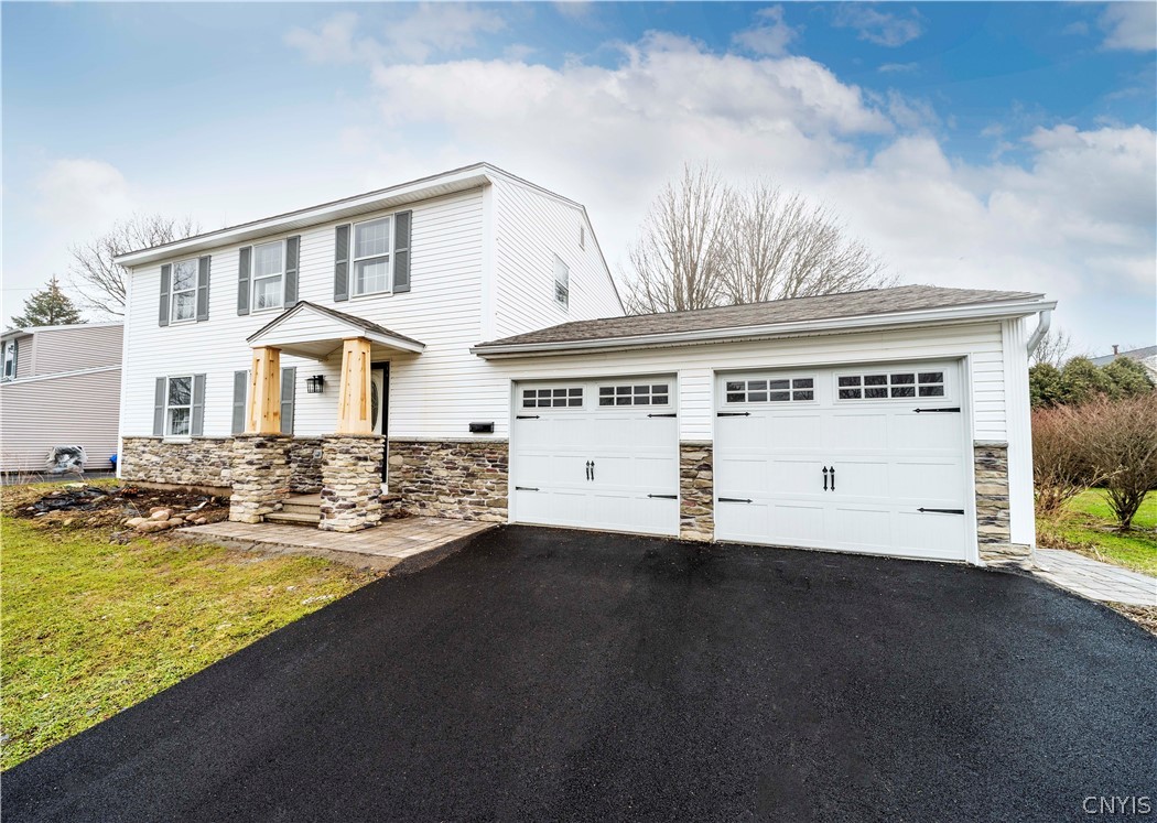 Front of the house, new driveway, stone work, ceda