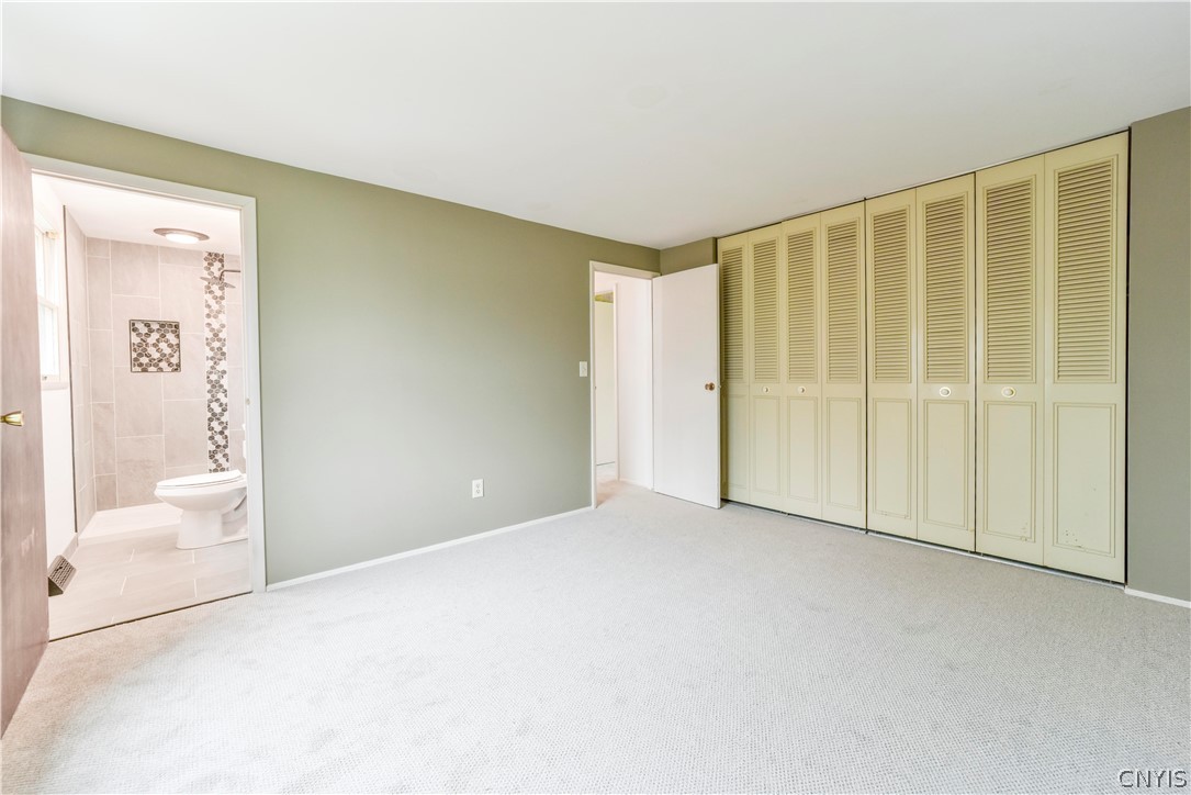 52 Cherry Tree Circle Clay, NY 13090 - Photo 16 of 38 Master bedroom with large closets and full bath wi