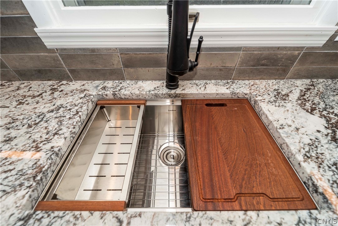 52 Cherry Tree Circle Clay, NY 13090 - Photo 8 of 38 Sink with built in cutting board & wash bay.