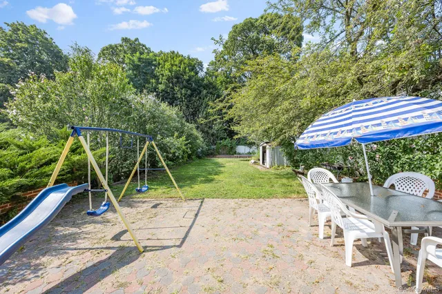an aerial view of houses with outdoor space