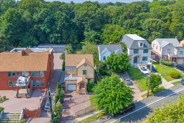a view of a chairs and table in the patio