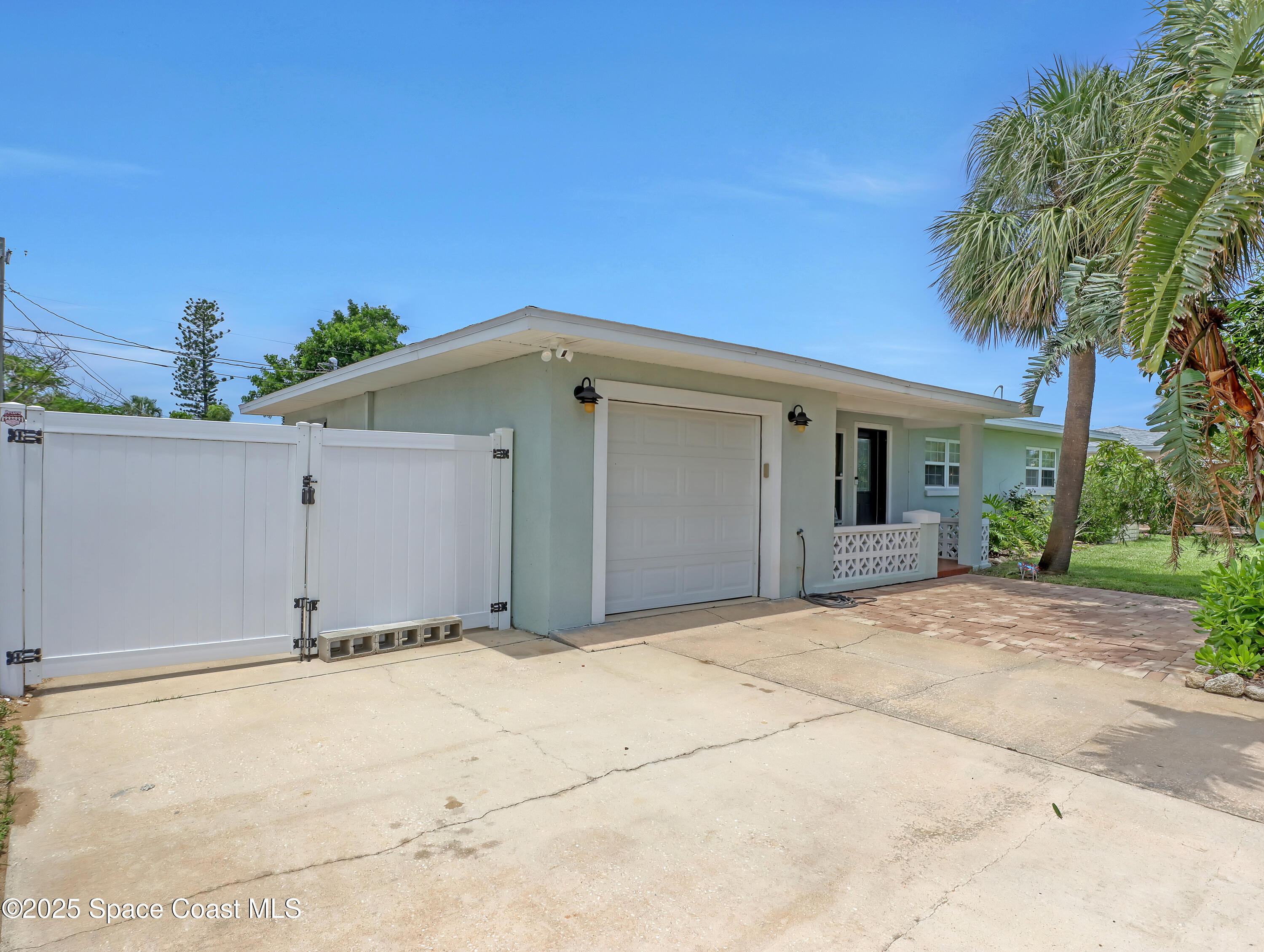 a view of a house with a garage
