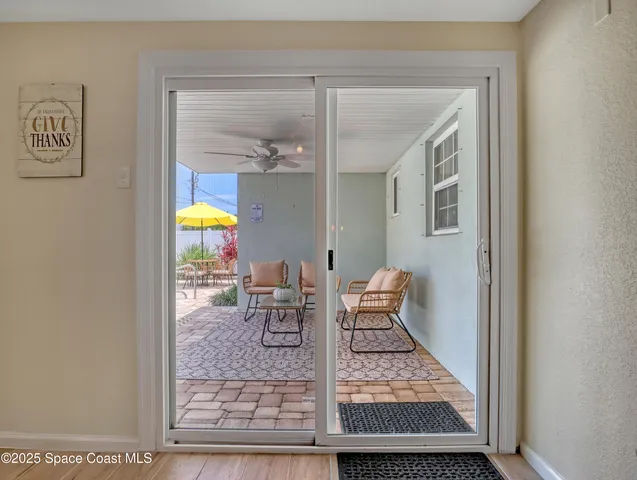 a view of dining room and wooden floor
