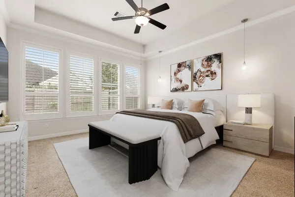 a spacious bedroom with a bed and window