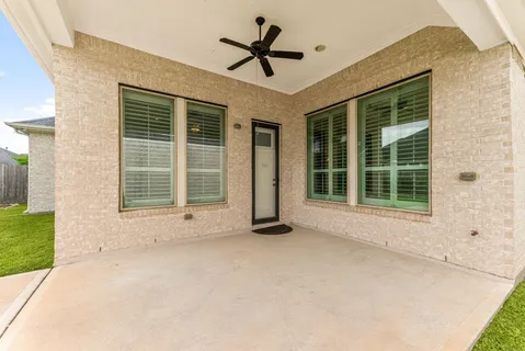 a view of a house with a large window