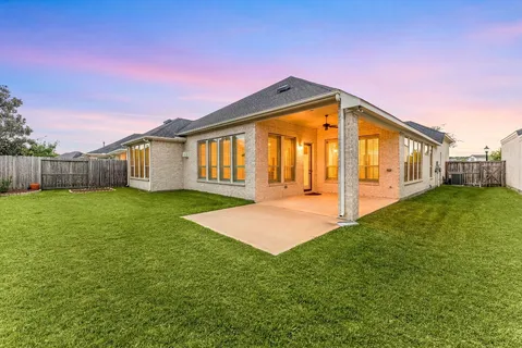 a front view of house with yard and porch